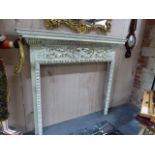 A 19th.C.CARVED AND PAINTED PINE FIRE SURROUND. THE MANTLE W.160 x H.139cms. OVERALL