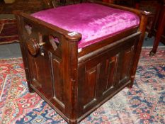 AN ANTIQUE ARTS AND CRAFTS ROSEWOOD HEIGHT ADJUSTABLE PIANO STOOL.