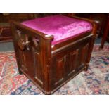 AN ANTIQUE ARTS AND CRAFTS ROSEWOOD HEIGHT ADJUSTABLE PIANO STOOL.