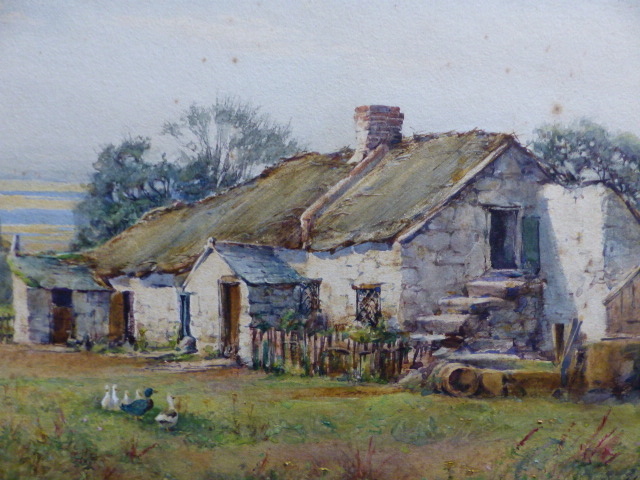 LINNIE WATT (1875-1908) A RUSTIC THATCHED COTTAGE. SIGNED WATERCOLOUR. 25 x 35cms.