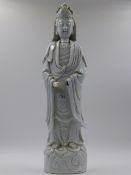 A CHINESE BLANC DE CHINE STANDING FIGURE OF A DEITY. H.44cms.