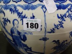 A CHINESE BLUE AND WHITE JARDINIERE DECORATED WITH PANELS OF FIGURES AND BIRDS AND WITH FOUR