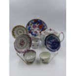 A NEWHALL TEAPOT AND COVER. WITH MATCHING CREAM JUG, THREE TEA BOWLS AND SAUCERS AND A PLATE