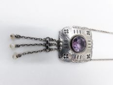 A 900 STAMPED CONTINENTAL WHITE METAL ARTS AND CRAFT STYLE AMETHYST AND PEARL PENDANT. APPROXIMATE