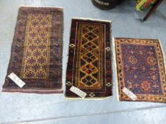 THREE ANTIQUE BELOUCH MATS. (3)