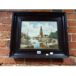 A CONTINENTAL DELFT POTTERY PLAQUE DECORATED WITH A CANAL SCENE. 28 x 36cms.