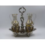A WHITE METAAL FRENCH OIL AND VINEGAR STAND FITTED WITH TWO CRUETS, MAKER ALPHONSE DEBAIN.