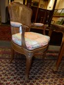 WITHDRAWN FROM SALE......A PAIR OF FRENCH LOUIS XV. STYLE SHOW FRAME ARMCHAIRS WITH CANE