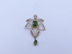 A 9ct STAMPED YELLOW GOLD SEED PEARL AND GREEN GEMSTONE ART NOUVEAU PENDANT. APPROXIMATE