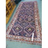 AN ANTIQUE PERSIAN TRIBAL RUG. 365 x 164cms.