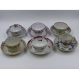 FOUR VARIOUS NEWHALL TEA BOWLS AND SAUCERS, A NEWHALL TEACUP AND SAUCER WITH BLUE AND GILT GARLAND