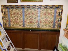 A LARGE 19th.C.OAK AND POLYCHROME DECORATED PANEL INSET WITH ARTS AND CRAFTS STYLE FABRIC PANEL OVER