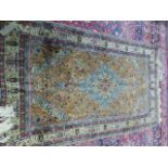 A PERSIAN TABRIZ RUG. 236 x 139cms.