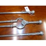 A LARGE SET OF GEORGIAN STEEL FIRESIDE TOOLS WITH RING KNOPS TO SHAFT AND BALL FINIALS. POKER L.