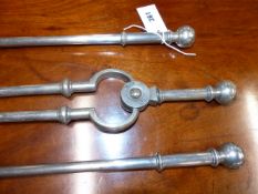 A LARGE SET OF GEORGIAN STEEL FIRESIDE TOOLS WITH RING KNOPS TO SHAFT AND BALL FINIALS. POKER L.