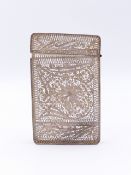 A WHITE METAL 19th CENTURY FILIGREE CARD CASE. APPROXIMATE MEASUREMENTS 8.5cms x 5.2cms x 0.7cms.