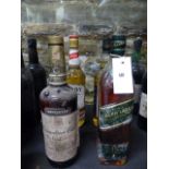 WHISKEY, IN FOUR BOTTLES TO INCLUDE CANADIAN CLUB PADDY, JOHNNY WALKER GREEN LABEL AND SIX ISLES