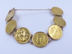 A GOLD SOVEREIGN BRACELET MADE UP OF SEVEN INDIVIDUALLY SET FULL SOVEREIGNS DATED 1906, 1911 X 2,