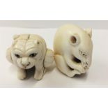 Carved Ivory Netsuke Rat nibbling his tail, signed to foot & Crouching Cat signed to foot (2)