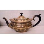 Silver Teapot with composition handle & finial, oval faceted body with domed faceted cover,