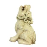 Carved Ivory Netsuke Howling Dog of Fo, signed to foot