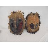 2 Lega Congo Shell Encrusted Ceremonial Masks with feather borders, circa 1900 (2)