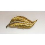 18ct Gold & Diamond Brooch in form of feather with graduated diamond central spine, steel pin