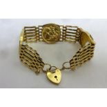 9ct Gold 6 Bar Gate Bracelet with heart shaped padlock, set 3 Victorian old head sovereigns, 1897,