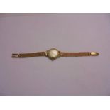 Ladies 18ct Gold Zenith Wristwatch with 18ct gold, silvered dial with baton markers