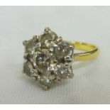 Ladies 18ct Gold Diamond Star Shaped Cluster Ring, central stone surrounded by 6 diamonds, size N