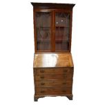 Small C18th Mahogany Bureau with 4 long graduated cock beaded drawers on bracket supports with