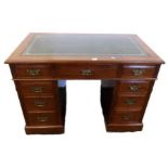 Late Victorian Walnut Pedestal Desk with twin 3 drawer pedestals, plate brass handles, plinth bases,