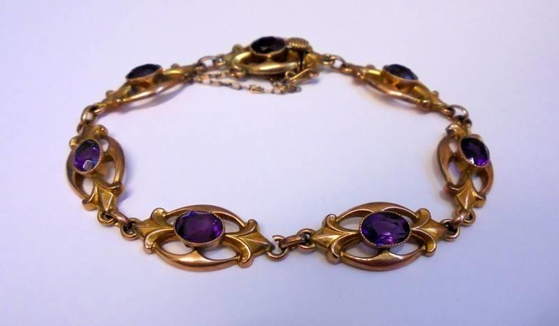 Ladies 9ct Rose Gold Amethyst Set Bracelet, 7 oval links each set with oval facet cut amethyst, with