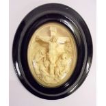C19th Carved Oval Religious Plaque depicting Jesus with attendant females embracing the cross, set
