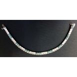 Diamond Tennis Bracelet stamped 14ct with 5 carats of blue & white diamonds