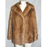 Ladies Mink Jacket with hook & eye fastening & spare pieces of fur for repairs etc.