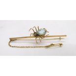 9ct Gold Set Aquamarine Spider Brooch with safety chain, nickel pin