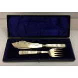 Pair C19th Victorian Mother of Pearl Handled Silver Bladed Fish Servers with silver ferrules, mother