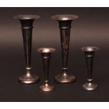 Two pairs of early 20th century silver "trumpet" spill vases, all with loaded bases, various