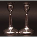Pair of Edward VII silver candlesticks of plain form (bases wrung), Birmingham hallmark 1908 (