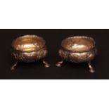 Pair of George II silver salts of circular form, bodies probably later moulded with rosettes and