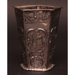 Early 19th century silver vase of tapering rhomboid form, the borders possibly later embossed with