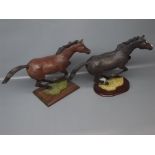 Wild Track figure: black and brown stallion in mid-gallop, raised on plinth (A/F) (2)