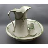 Victorian cream and green ground three-piece wash jug, bowl and toothbrush pot set with raised