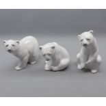 Three Lladro models of polar bears in varying poses