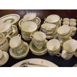 Quantity of Spode Provenance Model No Y7843 dinner/tea wares, of decorative green and gilded design