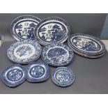 Group of four square formed willow pattern Washington blue and white plates together with a 19th