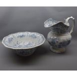 Victorian blue and white wash jug and bowl with printed floral decoration, shaped edge and handle (