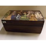 Vintage box with decoupage type lid containing various dolls and other clothing