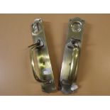 Two brass door latches